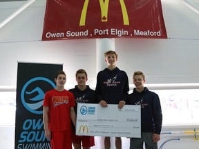 From left to right, Marcus Beckstead-Holman, Russell Burton, Thomas McDonald, and Colin Campbell of the Guelph Marlins Aquatic Club set a new Canadian national age group record for 13-14 year-olds in the 400-metre medley relay at the YMCA pool in the Julie McArthur Regional Recreation Centre during the Owen Sound Aquatic Club's 5th Annual McDonald’s Canadian Record Challenge. Photo submitted.
