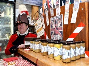 Chris Shelley, a.k.a. Maj.-Gen. Sir Isaac Brock, supervises the Mustard Poll at General Brock's Commissary on Brock Street in Kingston, which may predict the results of the Ontario election. (Ian MacAlpine/The Whig-Standard)