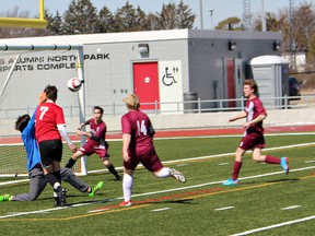 Sam Barrowcliffe (7), of Paris District High School, scores his first goal of the Brant County high school season against Pauline Johnson Collegiate at Bisons Alumni North Park Sports Complex on Monday. Paris won 4-0. (Vincent Ball/The Expositor)