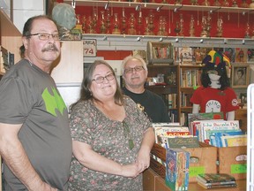 Bill Gay and Donna and Bob Berry have faith in Gore Street as a place to do business, now, and, looking ahead, once the city has finished making changes to the street and more businesses find a reason to set up shop there.