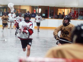 Wallaceburg Red Devils player Vern Hill gets ready to shoot the ball during a game versus Windsor at Wallaceburg Memorial Arena on Sunday, April 22.