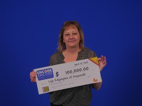 Submitted photo
Lija Edgington of Maynooth is $100,000  richer after her win on the April 14 Encore draw. She matched the last six of seven Encore numbers in exact order to win the $100,000 prize. Encore can be played in conjunction with most online lottery games for an extra $1. There is an Encore draw every day. The winning ticket was purchased at Maynooth General Store on Highway 62 in Maynooth.
