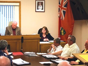 Photo by Chloe Kneer/For The Mid-North Monitor
Deputy Mayor Bill Foster records the votes for acceptance of the OPP proposal. The vote was unanimous, 6-0 in favour.