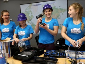 Chatham resident Madison Vickery, 16, second from right, is seen here with some other members of the Amazon Warriors robotics team, including Jenna Reaume, 14, left, Valerie Alexander, 14, and Mackenzie Sulyak, 14, in a photo taken November 26, 2017. The team is in Detroit, Mich., competing at the FIRST Robotics world championships. (Nick Brancaccio/Postmedia Network)