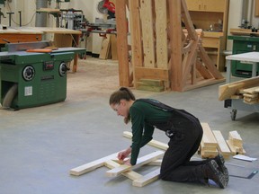 Kelsey Stromstedt competing in carpentry at the NW Alberta Regional Skills Competition 2018