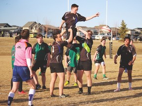 Hawk Ethan Warren passes the ball to a teammate during a game last Thursday against a Medicine Hat squad in Lethbridge. Stephen Tipper Vulcan Advocate