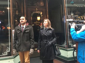 Kingston City Coun. Laura Turner and Andrew Bacchus of the Kingston Economic Development Corporation are followed by a media member while touring downtown Watertown New York on Thursday April 19, 2018