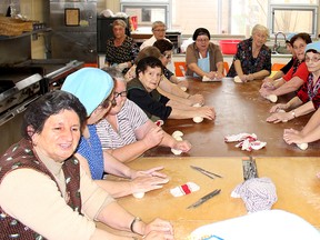 These ladies were busy making bread in Chatham, Ont. on Wednesday April 25, 2018 in preparation for the 50th annual Festa Della Madonna Delle Grazics being held at St. Ursula Roman Catholic Church on Sunday, April 28, 2018. (Ellwood Shreve/Chatham Daily News)