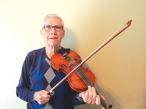 Photo by KELLY JAMES/FOR THE STANDARD
Legendary local fiddle player Earl Bell displays the technique that has made him a favourite musician for people all along the North Shore for more than 70 years. In recognition for his extraordinary contributions to country music, Bell will be inducted into the Great Northern Opry at the Northern Ontario Country Music Awards weekend in Sault Ste. Marie later this year.