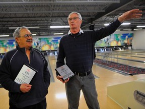 Simcoe Special Olympics volunteers Wayne Smith and Cliff Butler address the crowd at the White Horse Bowling Lanes Friday night after being recognized for 30 years of service. Jacob Robinson/Simcoe Reformer