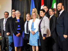 Premier Rachel Notley joins with Strathcona County council and local MLAs Annie McKitrick and Estefania Cortes-Vargas for a photo op, following a speech at a Chamber of Commerce luncheon on April 24.