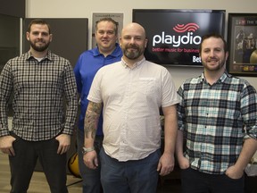 London-based Playdio, including consultant Cameron Gibson, left, president Dan Martens, director of sales Mat Lunnen and business developer Derek Povey, provides customized playlists, videos and in-house promotions to help businesses boost their brands. (Derek Ruttan // Postmedia News)