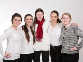 Bethany Scott (left to right), Gabrielle Scott, Alexandra Claggett, Emma Fleming, and Olivia Korsholm developed Second Threads together as part of the Junior Achievement Company Program.