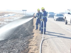 Members of the Melfort Fire Department extinguished hot spots at a grass fire west of Melfort on Thursday, April 26.