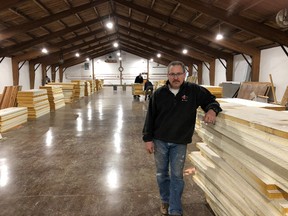 BRUCE BELL/THE INTELLIGENCER
Prince Edward County Curing Club president Ron Stakes is pictured with insulation for a new floor at the Picton club. Members at the 55-year-old facility are doing the bulk of the work.