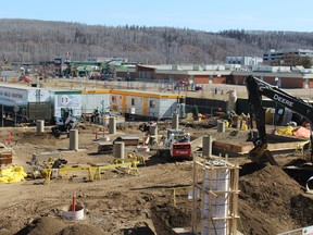 Construction crews work on the helipad outside the Northern Lights Regional Health Centre in Fort McMurray, Alta. on Friday, April 27, 2018. Vincent McDermott/Fort McMurray Today/Postmedia NEtwork