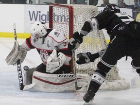 Listowel Cyclones goalie Max Wright makes a save on Caledonia’s Eric Eschweiler during the first period of Friday’s Sutherland Cup Game 2 in Listowel. The Cyclones won 6-3 and lead the series 2-0. Cory Smith/The Beacon Herald