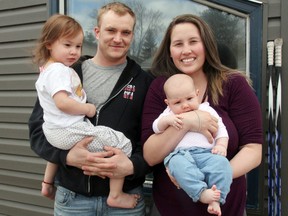 Cody Wilson and his family - fiance Vyctoria Barling (right) and daughters Jazmyn Wilson, two, and Madisyn Wilson, three months - had a terrifying experience the evening of Thursday, April 26 when they came face-to-face with a man with allegedly stolen rifle. SHERI LAMB/Daily Miner and News/Postmedia Network