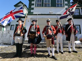 Wayne Renaud, from left, Amanda Fasken, Marcio Da Cunha, Scott Turrall and Kenneth MacNeil present some living history at the Fairfield-Gutzeit House in Bath on April 21. (Meghan Balogh/The Whig-Standard/Postmedia Network)