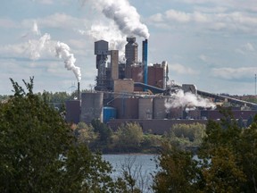 The Northern Pulp Nova Scotia Corporation mill is seen in Abercrombie, N.S. on October 11, 2017. An Environment Canada analysis says the federal government's carbon pricing plan will eliminate as much as 90 million tonnes of carbon dioxide by 2022. That is the equivalent to taking more than 20 million cars off the road and accounts for about 12 per cent of the total amount of what Canada emitted in 2016. THE CANADIAN PRESS/Andrew Vaughan