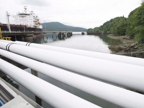 A ship gets its load of oil from the Kinder Morgan Trans Mountain Expansion Project's Westeridge loading dock in Burnaby (Jonathan Hayward | CP).