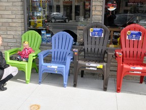 While out for a stroll on main street Mitchell last Friday morning, April 27, 11-month-old Cheyenne Leversage needed a rest and chose to sit on the green patio chairs that were lined up in front of Faust Home Hardware. She had other colours to choose from, clearly. Mom Shannon said she and Cheyenne were out enjoying the nice weather now that spring – hopefully – has arrived. Warmer temperatures are expected this week, and they should, it’s May! ANDY BADER/MITCHELL ADVOCATE