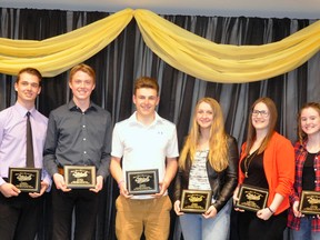 Recognized as Mitchell Minor Sports athletes of the year in their respective sport during the Stephen Elliott Memorial Awards banquet held April 27 at the Mitchell & District Community Centre were Kyle Richardson (second from left, baseball), Jarett Vogels (hockey), Quaid Austin (soccer), Sarah Skinner (hockey), Katelyn Ludington (soccer) and Analese Chaffe (fastball). Also pictured are members of the Elliott family, son Dave (left) and daughter Vicki Smith (right). Absent was Erika Neubrand (ringette). ANDY BADER/MITCHELL ADVOCATE