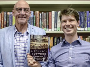 Co-authors Bryan Davies (left) and Andrew Traficante display a copy A Boy from Botwood at the Prince Township Public Library. The book may be ordered locally at Coles or online from chapters.indigo.ca or amazon.ca. Marguerite LaHaye/Special to The Star