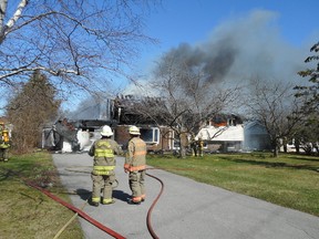 Submitted photo
Fire crews from Station #3 Bayside responded to Whites Road again for another fully involved house fire after numerous 911 calls to 568 Whites rd at 3:30 pm. Monday, With the wind the fire spread very quickly, said Chief John Whelan.  Fire crews had to water down adjacent homes.An elderly woman that lived in the home was unaccounted for at the time of the fire. She was found later unharmed, and not at her home. Quinte West OPP. Hydro One and Union Gas all responded to assist at the scene, Tankers were brought in from Batawa and Tuckers Corners, Chief Whelan estimates the damage at approximately $300,000.