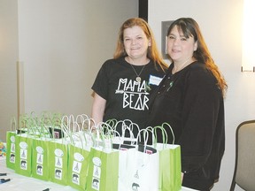 Connie Raynor Elliott, “Mamabear” and Lisa Damignani of O’Sullivan Funeral Home pose with opioid conference kits. They report ‘lively’ conversation at Friday night’s forum, and “lots” learned over the course of the weekend.
Allana Plaunt/Special to Sault This Week