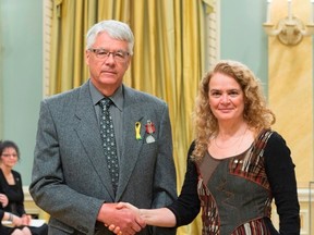 Former Melfort resident Alan DeBusschere (left) was presented with the Sovereign Medal for Volunteers by Governor General Julie Payette.