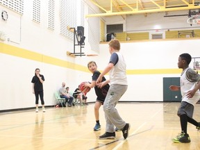 Nipawin (in black) played Melfort on Sunday, April 28 during the Steve Nash Youth Basketball final tournament.
