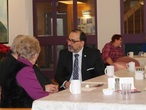 Photo supplied
Sudbury MPP Glenn Thibeault chats with residents of Le Club Amical du Nouveau Sudbury, one of up to 40 new Seniors Active Living Centres across the province. The centre is receiving $42,700 to offer seniors more programming to meet their fitness, healthy lifestyle and learning needs.