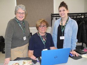 Nearly 20 volunteer income tax preparers in Norfolk were extra busy this tax season. They served nearly 700 clients at branches of the Norfolk County Public Library and at Norview Lodge in Simcoe. Among those helping individuals access the income-support programs they need were, from left, Judy-Ann Macaulay of Simcoe, Christine Booth of Port Dover, and Fanshawe placement student Emily Colibaba of Simcoe. MONTE SONNENBERG / SIMCOE REFORMER