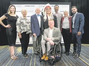 Canada Sports Hall of Fame Class of 2018 include, left to right, cross-country skier Chandra Crawford, Maureen Baker, daughter of pioneering baseball player Mary Baker, former Toronto Maple Leafs player Dave Keon, Indigenous sport organizer and advocate Wilton Littlechild, wheelchair racer Jeff Adams, CFL legend Damon Allen, rower Dr. Sandra Kirby, and diver Alexandre Despatie in Toronto on Thursday, April 26, 2018. Photo supplied by Canada Sports Hall of Fame