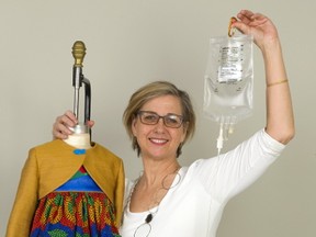 Fanshawe College student Kelly Scott stands with an outfit she designed on display at the school’s annual Unbound fashion show. The aspiring designer has created a number of outfits designed for children required to wear medical equipment. (Mike Hensen/Postmedia News)