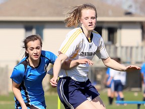 Chatham-Kent Golden Hawks' Camille Blain, right, and Great Lakes Wolfpack's Hannah Malott battle for the ball in the first half of an LKSSAA senior girls' soccer game at the Chatham-Kent Community Athletic Complex in Chatham, Ont., on Tuesday, May 1, 2018. (MARK MALONE/Chatham Daily News/Postmedia Network)