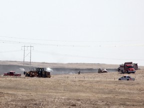 The Hanna Fire Department, the Hanna RCMP and the Special Areas, as well as local ranchers banded together against a grassfire a few miles south-east of Cactus Corner on Saturday. The group quickly put out the fire before any livestock or buildings were at risk. Photos by Jackie Irwin/ Hanna Herald