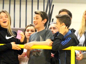 Students at Korah Collegiate and Vocational School react during a chuck a duck fundraiser for Pedals for Possibilities on Thursday.