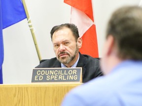 City Coun. Ed Sperling speaks with Richard Gagnon, the city’s director of infrastructure management, during the April 24 meeting.