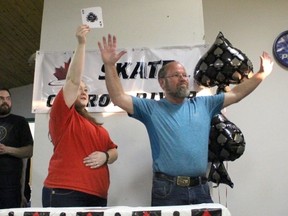 Rick Colburn, right, pulled the Ace of Spades on the 17th try, at Carrot River’s final Chase the Ace Monday, April 30. He was serving as proxy for Leslie Irving, a teacher from Tisdale. Left is Kristin Faure of Skate Carrot River.