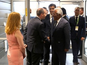 Elliot Ferguson/The Whig-Standard
Kingston Mayor Bryan Paterson and Donna Gillespie of the Kingston Economic Development Corporation welcome Portugal’s Prime Minister Antonio Costa to Frulact’s plant in the city’s west end on Thursday.