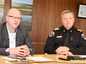 Mayor Don Scott sits with Regional Fire Chief Jody But during a press conference at the Jubilee Centre in Fort McMurray, Alta. On May 3, 2018. Vincent McDermott/Fort McMurray Today/Postmedia Network