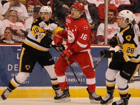 Hamilton Bulldogs winger Nicholas Caamano (left), Soo Greyhounds centre Morgan Frost and Bulldogs winger Marian Studenic, follow the play during first-period OHL championship action Thursday, May 3, 2018, at Essar Centre in Sault Ste. Marie, Ont. JEFFREY OUGLER/SAULT STAR/ POSTMEDIA NETWORK