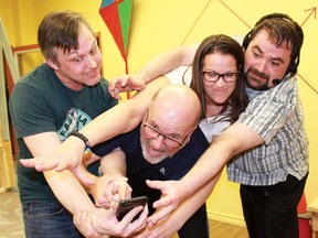 Erik Shaw, Kevin Oates, Christine Baribeau and Steven Reinhardus rehearse a scene from Theatre Kent’s production of Nooses Off, running from May 10 to May 12. Handout/Postmedia Network