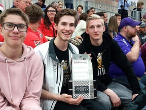 Left to right: Robotics teammates Chris Crowe, Jonah Hansen and Evan Pritchard show off the Build Award they received at the VEX Robotics World Championship held in Kentucky . The accolade is presented to the team with a well-crafted robot.

Photo Supplied