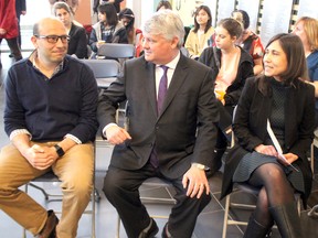 MP Terry Sheehan gives a playful elbow to Canada Research chair Pedro Antunes before announcing a second Canada Research Chair to Isabel Molina, at right, at Algoma University's Essar Convergence Centre on Friday morning. The federal government is earmarking $500,000 over five years to assist Molina's research in plant lipid metabolism.