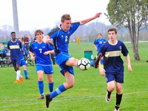 Matt Lyons of the Simcoe Sabres goes airborne to try and re-direct a pass during NSSAA boys soccer action in Delhi vs. the Raiders Thursday. The Sabres won their third game of the year by a score of 2-0.
JACOB ROBINSON/Simcoe Reformer