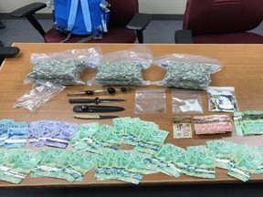 Drugs and cash seized in Saugeen Shores on Monday. (Supplied photo)