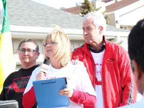 April Phillips, Kevin's wife, spoke about how much the Walk a Mile in Her Shoes event meant to her late husband. a room at the NEOSS shelter was dedicated in his memory on May 3 before the event.